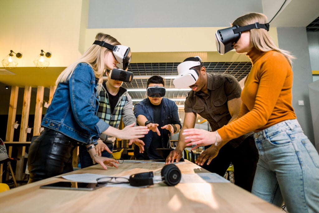 business people using virtual reality goggles duri 2022 05 11 08 36 40 utc scaled 1